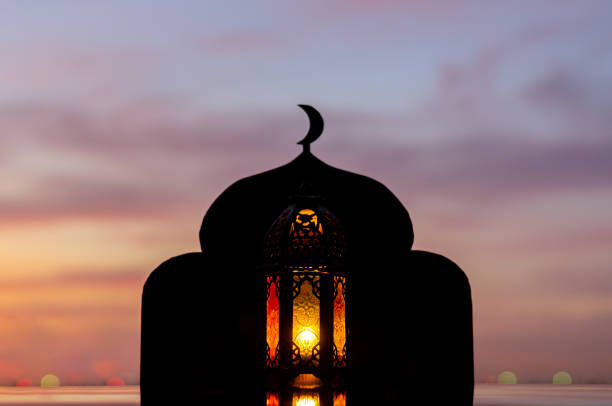 istock Lantern with blurred focus of mosque background 1322451033