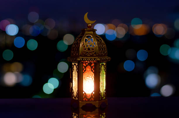istock Lantern that have moon symbol on top with night sky 1322451034