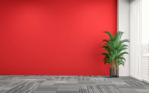 istock Empty office interior with a potted plant and windows 1322453560