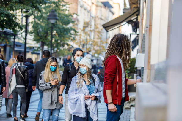 istock People in a Queue is Standing Waiting to Withdraw the Cash at ATM. 1322454448
