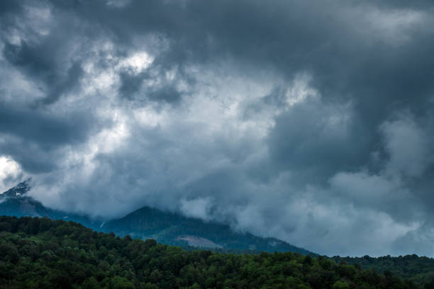 istock Stormy clouds above Caucasus mountains. 1322455726