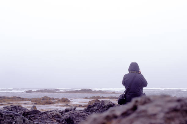 istock Photographer at the beach in Iceland 1322460876