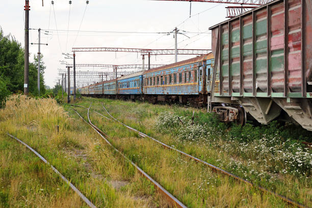 istock Transport - old Freight and passenger railroad cars train 1322463468