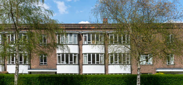 Building exterior for residential apartments along a main road in Cambridge, UK.