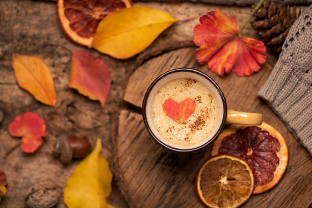 Autumn cozy cup of coffee Cup of coffee and autumn season symbols for cozy time at home. Flat lay top view november stock pictures, royalty-free photos & images