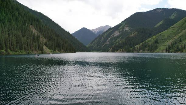 istock Kolsai mountain lake and green forest. Top view 1322468680