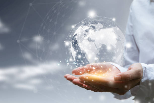 istock Businessman holding in hands with global connection concept. Energy saving concept. 1322469069
