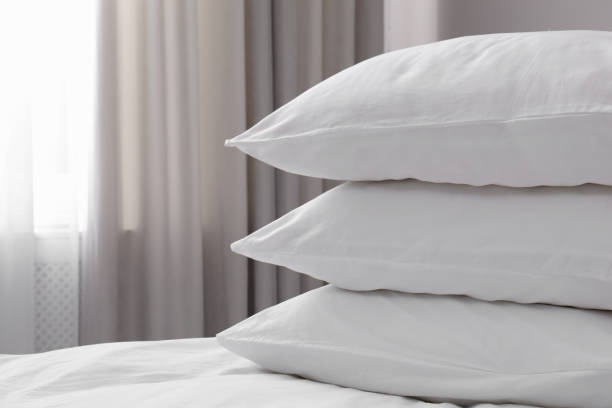 white soft pillows on bed. space for text - pillow imagens e fotografias de stock
