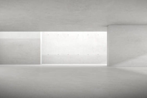 istock Abstract 3d rendering of empty concrete room with light and shadow on the wall. 1322473255