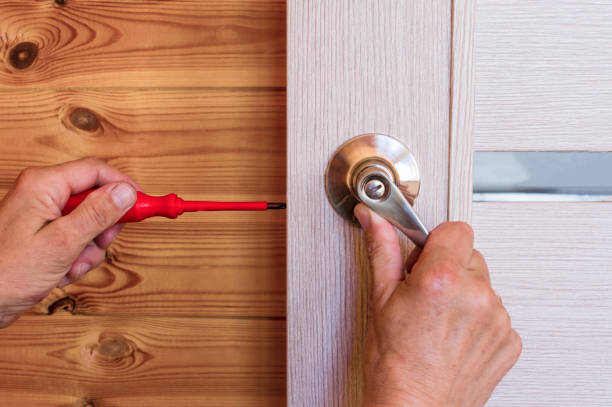 istock Close-up Of Man's Hand Installing Door Lock At Home 1322476795