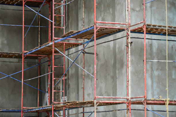 istock renovation or repair of a building facade using scaffolding 1322477144