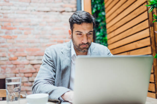 istock Young man making business in the coffee break 1322477535