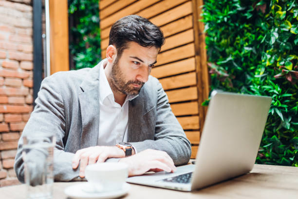 istock Young man making business in the coffee break 1322478167
