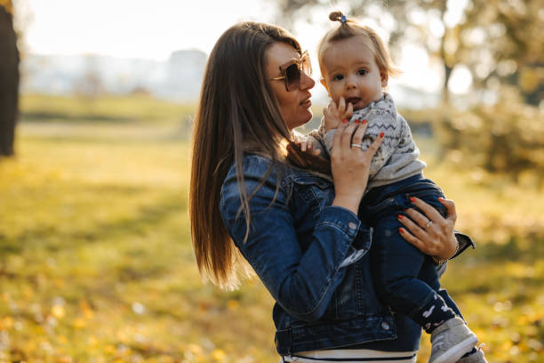 istock Happy and peaceful in mother's arms 1322478743