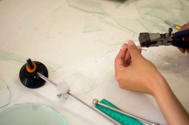 istock young woman working with glass in her own workshop 1322480494