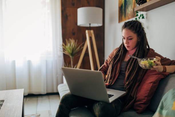 istock Dedicated female journalist, surfing the net, while looking for an inspiration for her next online article, while working from her cozy home office 1322483129