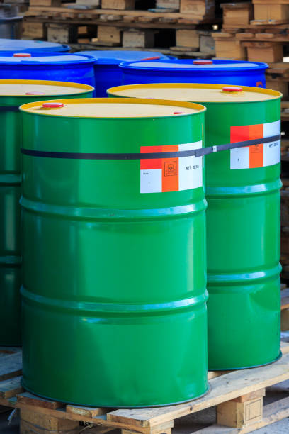 istock Green barrels with label poison on wooden pallets 1322484038