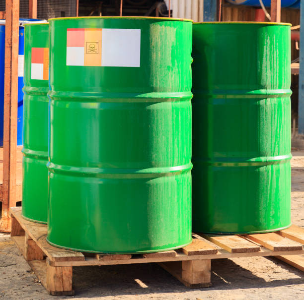 istock Green barrels with label on wooden pallets 1322484101