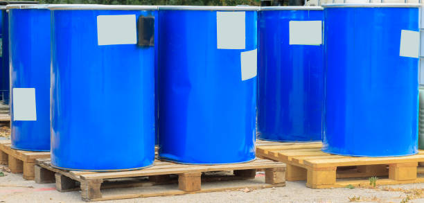 istock Blue barrels on wooden pallets 1322484279