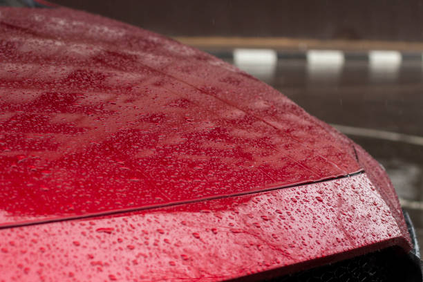 istock The surface of the car in raindrops. 1322485300