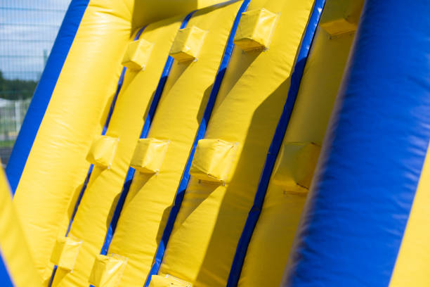 istock Inflatable obstacle course for fun. Inflatable structure in the park. 1322485323