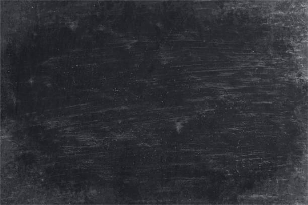 Black coloured rough texture grunge vector backgrounds like a blackboard with grey marks of scratches all over Horizontal vector illustration of a empty, blank black coloured rough texture grunge vector backgrounds like a blackboard or a writing slate. blackboard stock illustrations