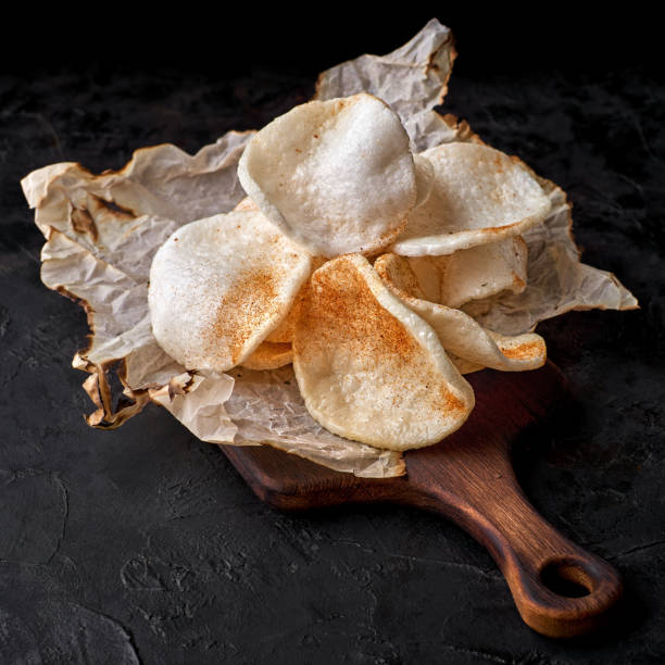 istock Prawn Crackers prawn chip,gluten free chip, beer snack on a dark table. 1322485829