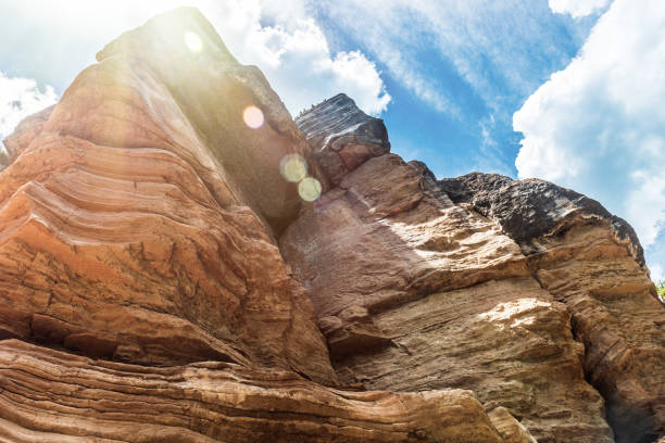 istock Stone rock against the blue sky 1322488116