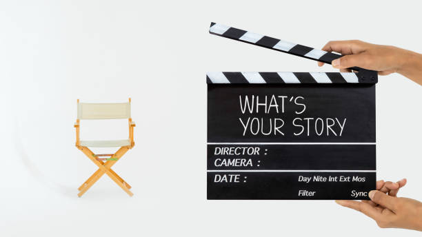 istock camera crew holding film slate 1322489040