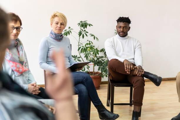 istock A group chatting in a mental health meeting 1322490158