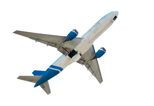 istock White plane isolated on white background. The charter passenger plane is flying 1322493070