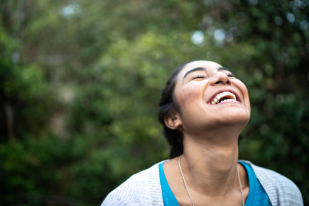 istock Happy woman inhaling at home 1322493476
