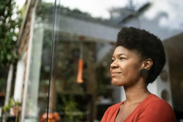 Photo of Mature woman contemplating at home