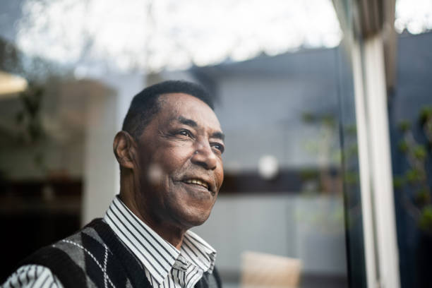 Senior man contemplating at home