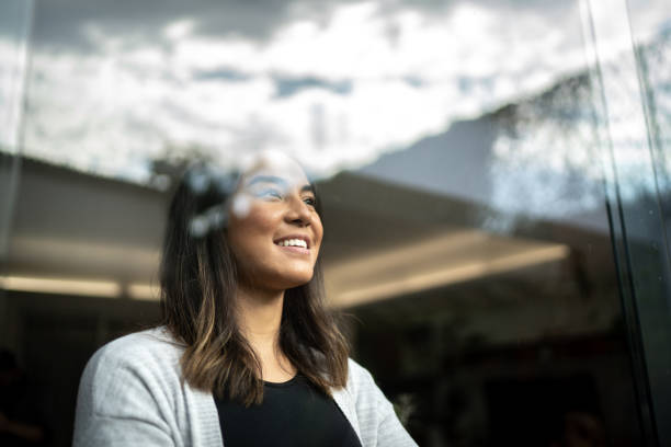 istock Young woman contemplating at home 1322493541