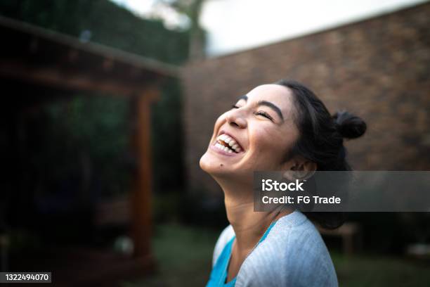 Happy Woman Inhaling At Home Stock Photo - Download Image Now - One Woman Only, Happiness, Laughing