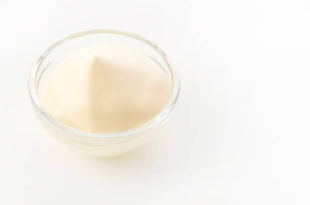 istock Delicious mayonnaise on white background 1322494425