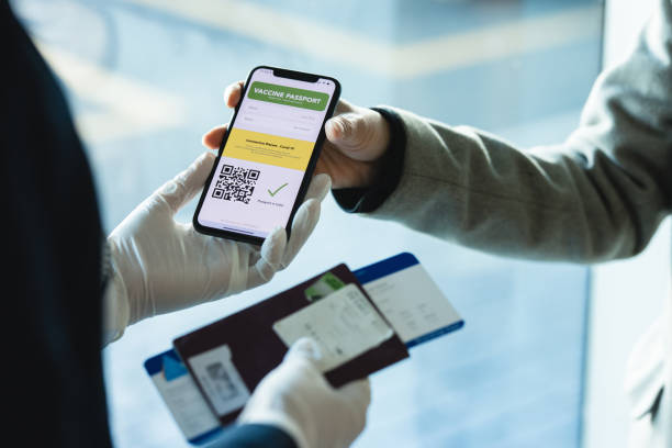 istock Passenger check in with immunity passport at airport 1322494450