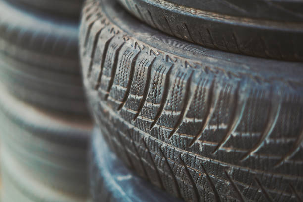 istock Stacks of old used car tires 1322494821