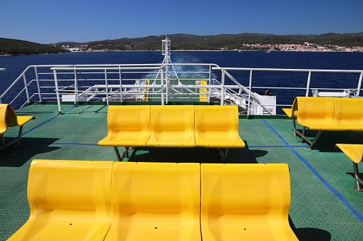 Croatia island ferry connection. Town of Orebic and Peljesac Peninsula seen from ferry ship.