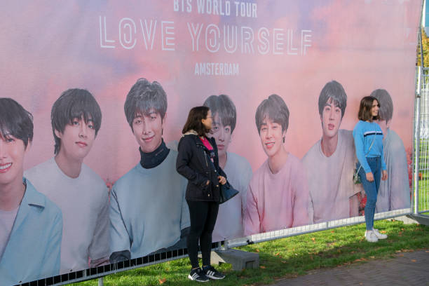 Taking Pictures At A Billboard With The BTS Group Taking Pictures At A Billboard Before The BTS Concert At The Ziggo Dome Amsterdam The Netherlands 13-10-2018 k pop stock pictures, royalty-free photos & images