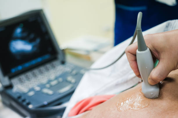 istock Doctor is examining heart's patient by echocardiogram 1322498206