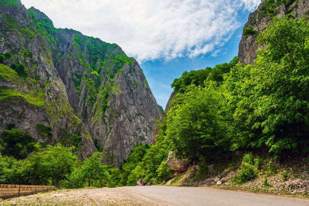 Almaty, Kazakhstan - june 16 2017 : Beautiful landscape of steppe and stone mountains along the road landscape outdoors road Kazakhstan