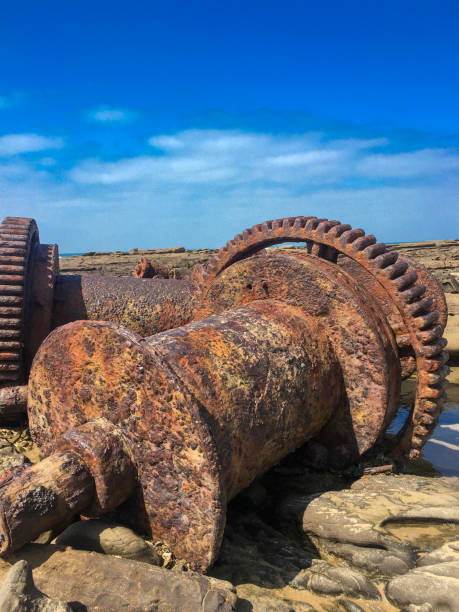 istock Rusted large metal gears from a stranded ship 1322502188