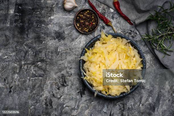 Sliced Sour Cabbage With Spices On A Plate Tabletop View Stock Photo - Download Image Now