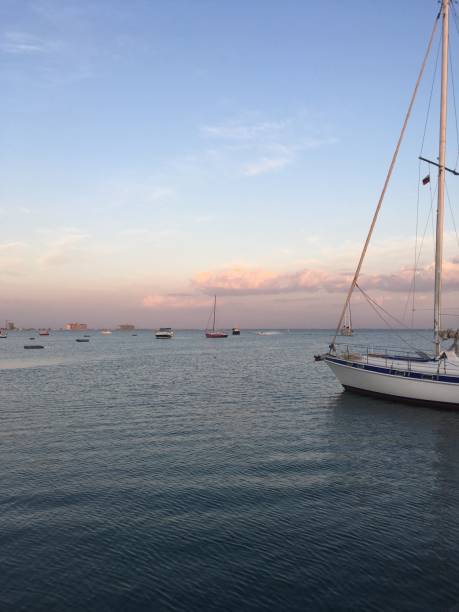 istock Sailing boats near a pier 1322511781