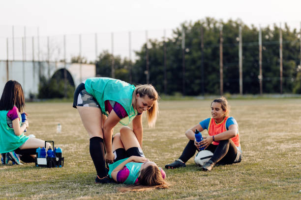 istock Girl having fun after a rugby training 1322512680