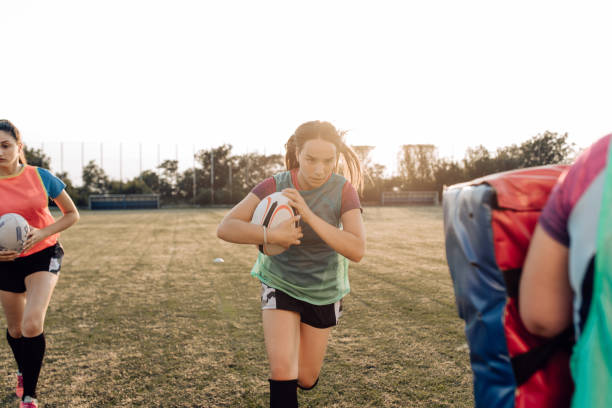 Girls from the university team training rugby