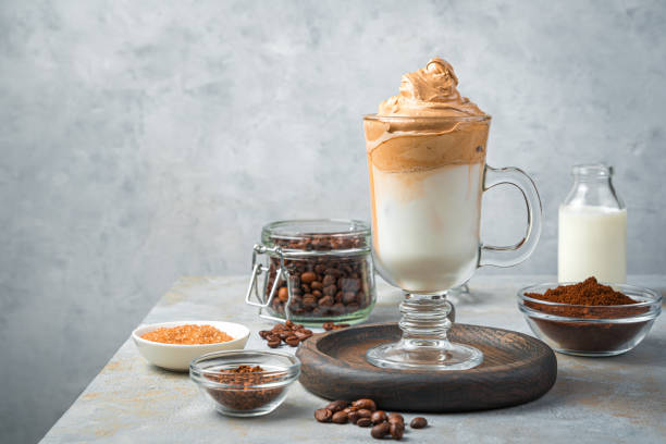 istock Dalgona coffee and ingredients on a gray background 1322513335