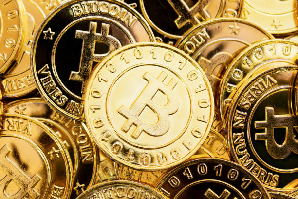 Bitcoin cryptocurrency background. A bunch of golden bitcoin, Digital currency Bitcoin cryptocurrency background. A bunch of golden bitcoin, Digital currency currency symbol photos stock pictures, royalty-free photos & images